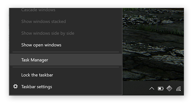 Opening Task Manager from the taskbar on Windows 10.