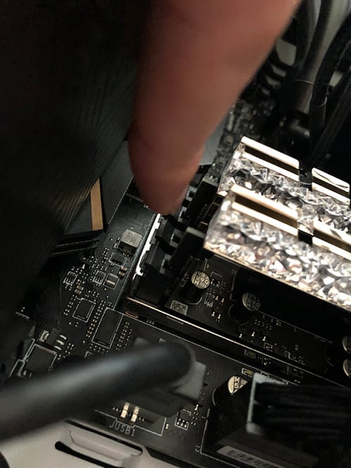 Removing a RAM module from a PC motherboard