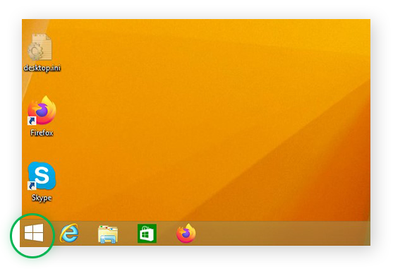 Het bureaublad in Windows 8.1 met daarop de locatie van het menu Start
