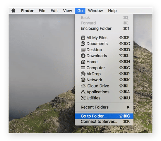 Screenshot of the Finder/Go dropdown menu with the Go to Folder option selected