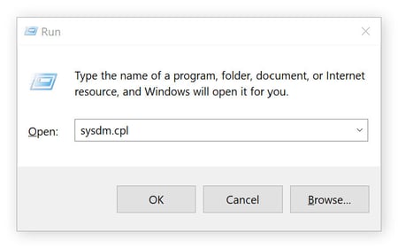 Opening System Properties to manage paging file size.