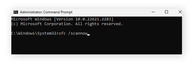 Typing "sfc /scannow" into Administrator: Command Prompt