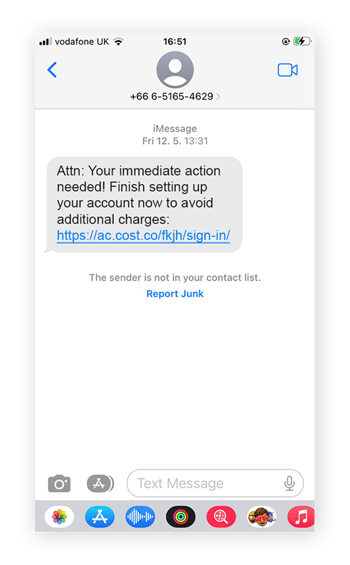 A phone screen showing a text message urging the receiver to click a link to finish setting up their account.