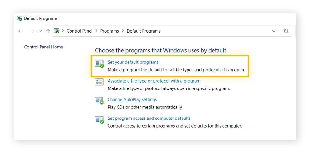 A screenshot showing how to access the "Set your default programs" menu in the Windows 10 Control Panel.