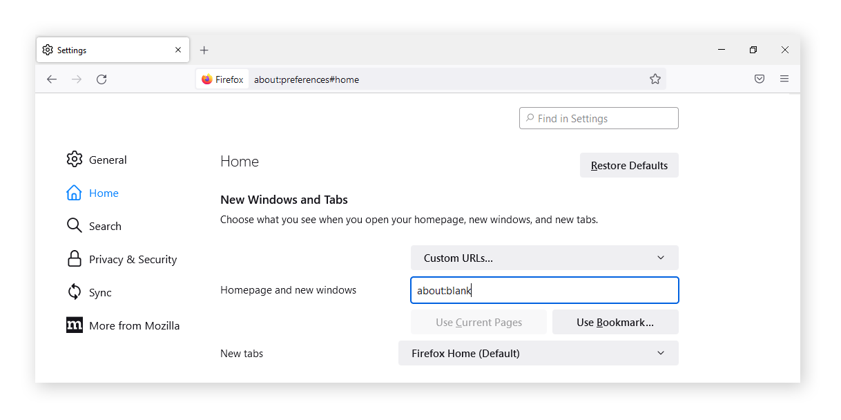 Entering "about:blank" as the custom URL for the "Home Page and New Windows" setting in Firefox.