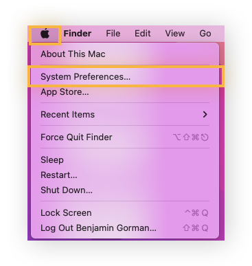 O menu Apple é aberto com as Preferências do sistema destacadas